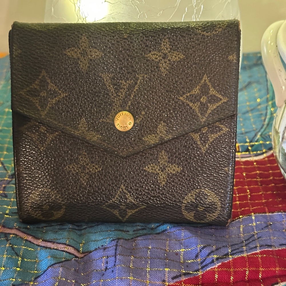 Vintage Louis Vuitton Bi-fold wallet.